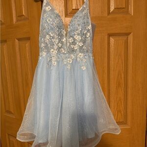 Elegant Blue Dress with Floral Details